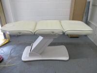 REM Excel Electric 3 Motor Beauticians Adjustable Treatment Chair/Couch Upholstered in White Vinyl and Comes with Controller, S/N 000183. NOTE: condition as viewed/pictured.