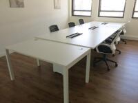 Contents of Office Suite to Include: 3 Section/6 x Pod Position Desk & 6 x White & Black Swivel Chairs. Desk Size W130 x D150cm.