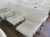 6 x White Faux Leather Canterlever Chairs on Chrome Frame.