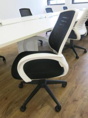 8 x Black & White Office Swivel Chairs.