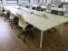 8 Position White Melamine Pod Desk with Power Units. Desk Sizes W140 x D70cm.