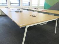 8 Position Beech Top on White Frame Pod Desks with Power Units. Desk Size W130 x D80cm.