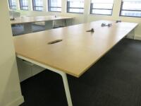 8 Position Beech Top on White Frame Pod Desks with Power Units. Desk Size W130 x D80cm.