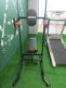 Contents of Small Gym to Include: Tunturi T30 Running Machine, Ephex Multi Station Pull-Up/Dip/Bench, 2 x Adjustable Weight Benches, Lions Bench, Weight Bar with Weights, Rubber Matting, Workout Ball with Stand, Medicine Balls & Stand, Coat Rack & Other I - 5