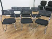 6 x Black Material Canterlever Stacking Chairs with Plastic Back on Chrome Frame.