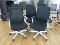 8 x Black & White Ergo Swivel Office Chairs.