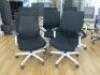 8 x Black & White Ergo Swivel Office Chairs.