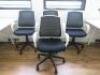 8 x Black & White Office Swivel Chairs.